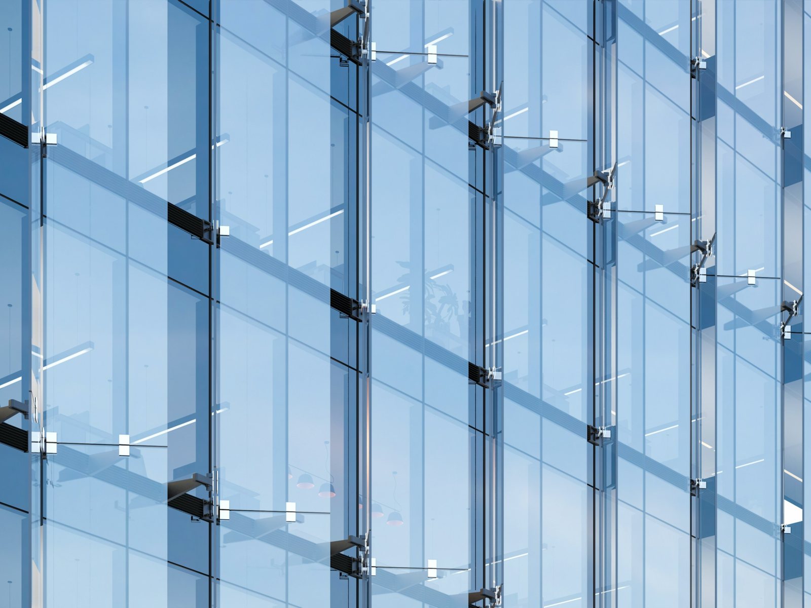 Close-up of a blue glass curtain wall on an office building